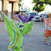 Local cultural groups provided dancing and music as about 100 persons attended the mural's unveiling.